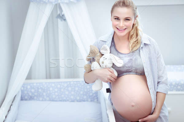 Cute pregnant woman at home Stock photo © Anna_Om