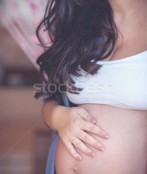 Новая жизнь фото беременная женщина прикасаться Сток-фото © Anna_Om