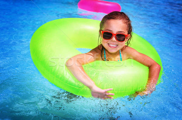Cheerful girl in swimming pool Stock photo © Anna_Om