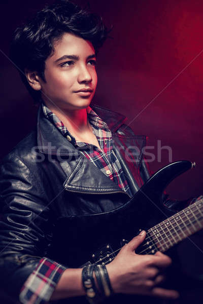 Handsome guy playing on guitar Stock photo © Anna_Om