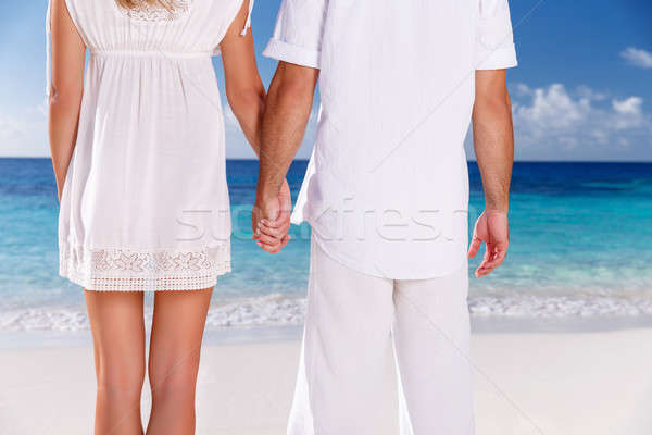 Young couple on the beach Stock photo © Anna_Om