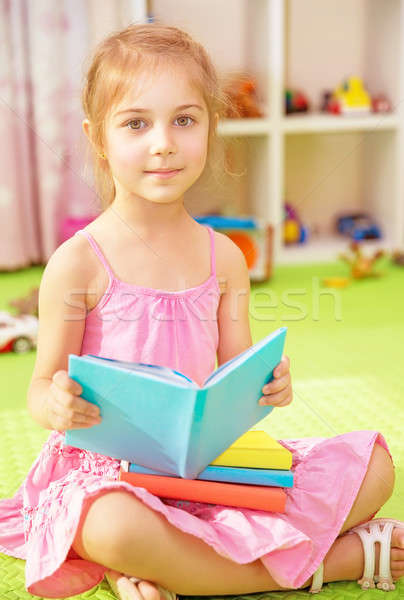 Cute мало школьница сидят домой полу Сток-фото © Anna_Om