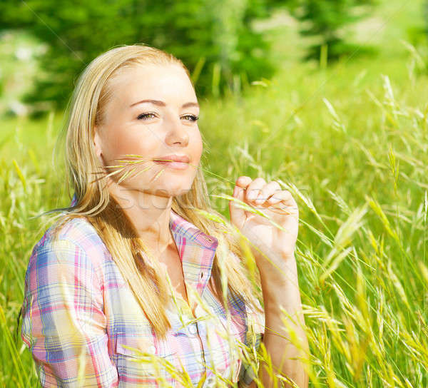 Cute girl on wheat field Stock photo © Anna_Om