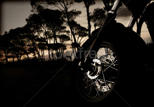 Motosiklet tekerlek gün batımı fotoğraf aktif Stok fotoğraf © Anna_Om