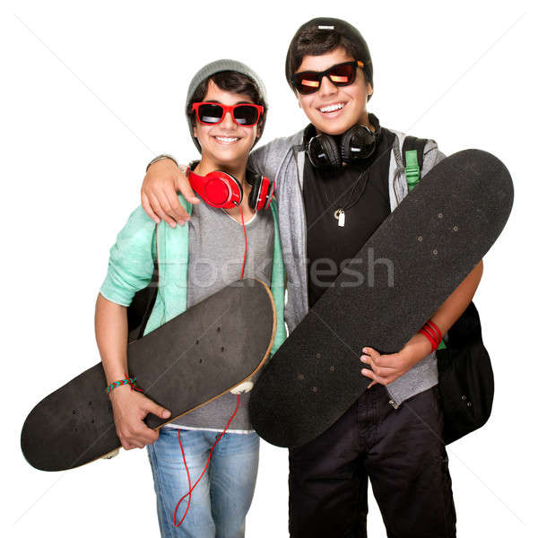 Due felice ascolto musica cuffie indossare Foto d'archivio © Anna_Om