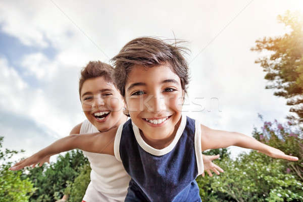 Happy brothers playing outdoors Stock photo © Anna_Om