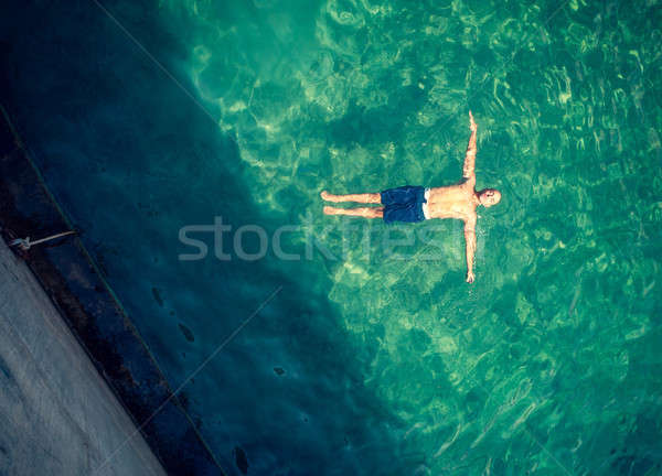 Man relaxing in the pool Stock photo © Anna_Om