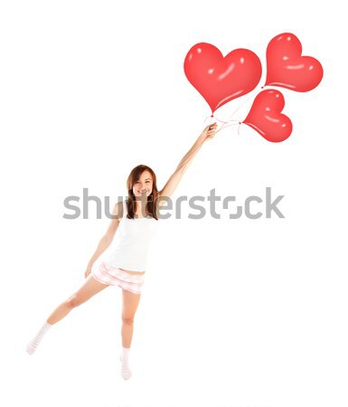 Happy girl flying, holding red heart balloons  Stock photo © Anna_Om