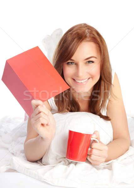 Happy female laying in the bed Stock photo © Anna_Om