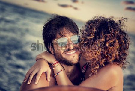 Hombre guapo retrato primer plano playa puesta de sol luz Foto stock © Anna_Om