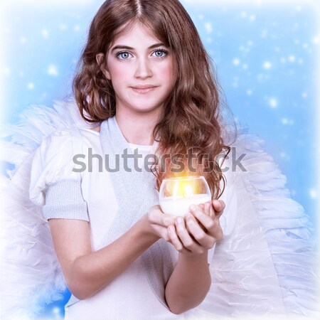 Stock photo: Attractive woman with candle