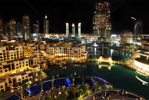 Nocturna de la ciudad Dubai centro de la ciudad noche agua edificio Foto stock © Anna_Om