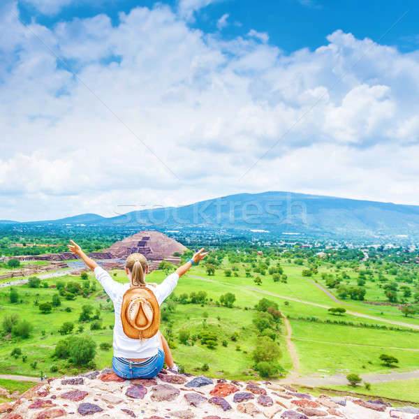 Stock photo: Traveler girl on the top of mountains