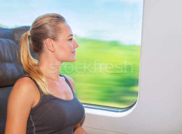 Tren güzel kız birinci sınıf bakıyor pencere Stok fotoğraf © Anna_Om