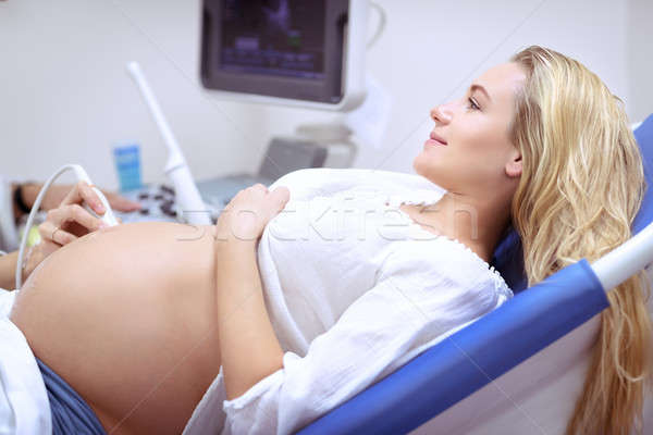 Pregnant woman on ultrasound Stock photo © Anna_Om