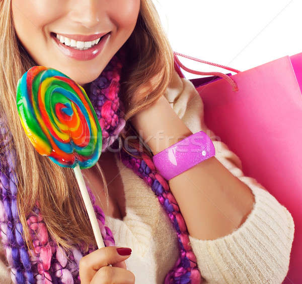 Woman eating sweet candy Stock photo © Anna_Om