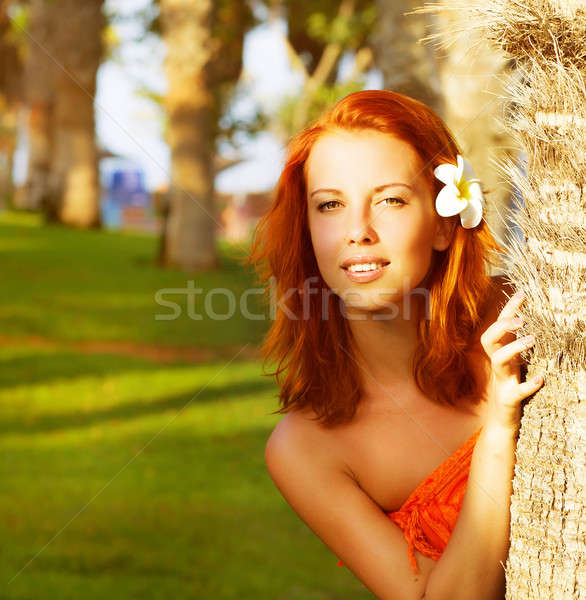 Cute girl near palm tree Stock photo © Anna_Om