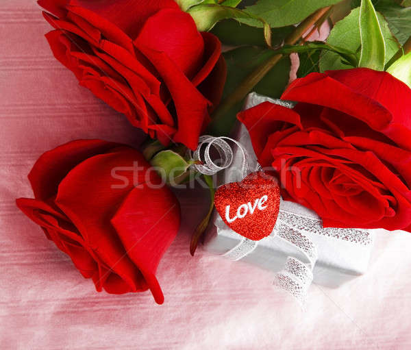 Stock photo: Beautiful roses with gift box & heart