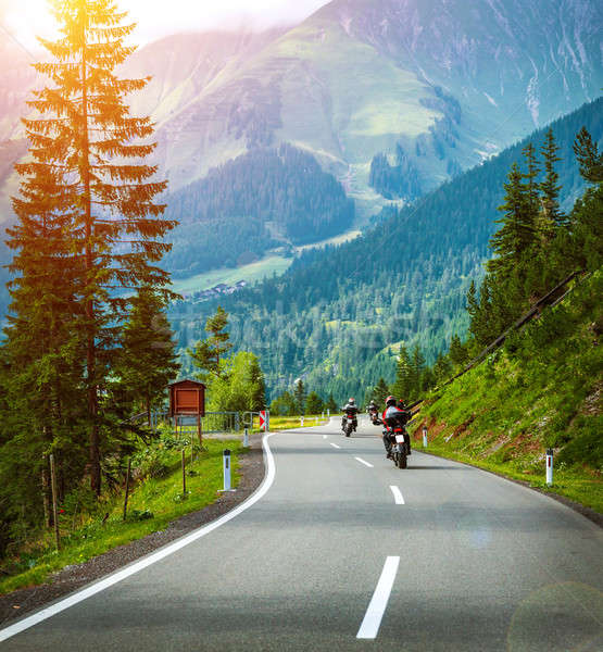 Stock photo: Group of bikers in Alps