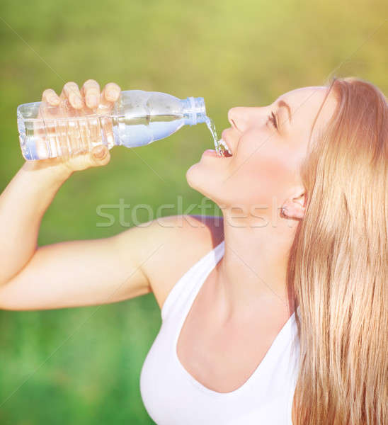 Healthy woman drinks water Stock photo © Anna_Om