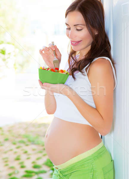 Pregnant female eat fruits Stock photo © Anna_Om