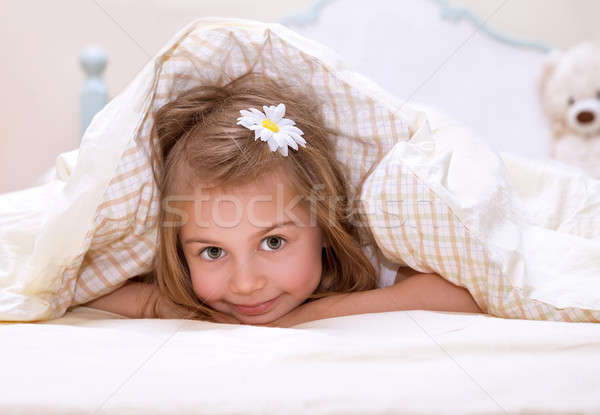 Stock photo: Little girl in the bed