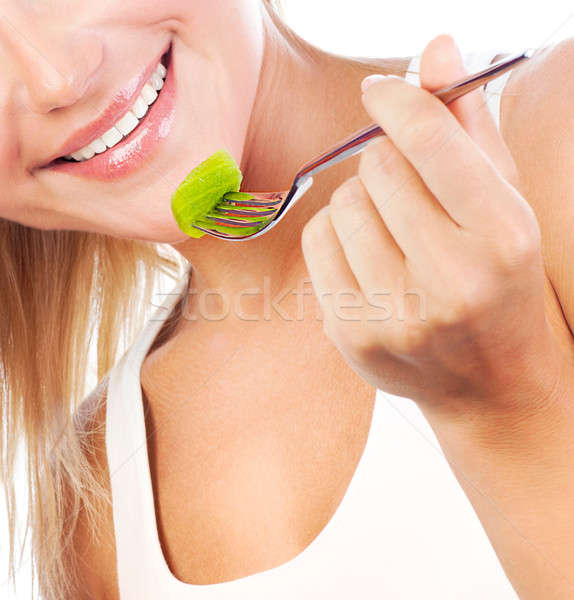 Primer plano boca comer frutas hermosa femenino Foto stock © Anna_Om