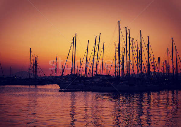 Segelboot Hafen Sonnenuntergang Silhouetten Luxus Wasser Stock foto © Anna_Om