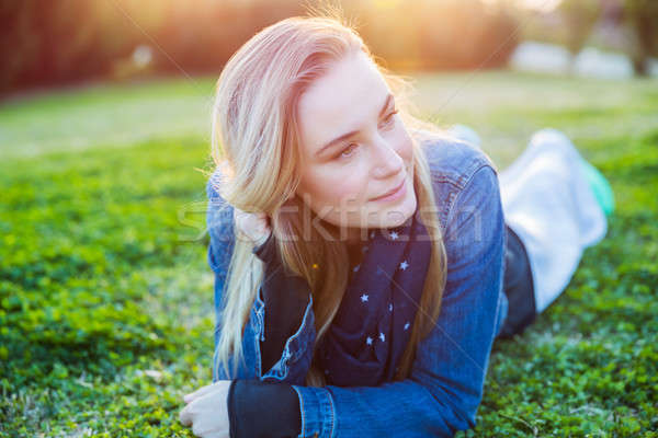 Belle femme détente extérieur portrait couché herbe verte [[stock_photo]] © Anna_Om