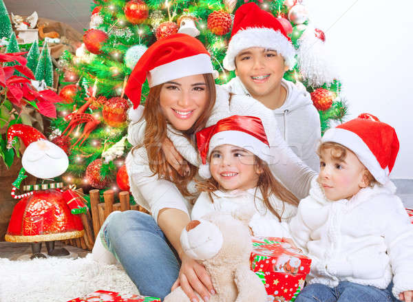 Stock photo: Happy family celebrating Christmas