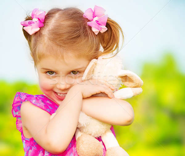 Happy girl with soft toy Stock photo © Anna_Om