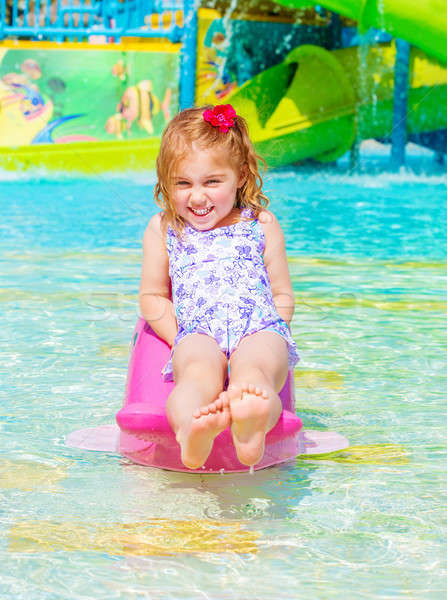 Happy girl on water attractions Stock photo © Anna_Om