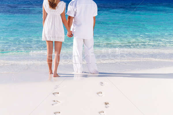 Young couple on the beach Stock photo © Anna_Om