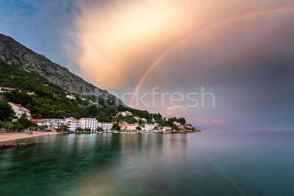 Rainbow piccolo frazione pioggia cielo casa Foto d'archivio © anshar