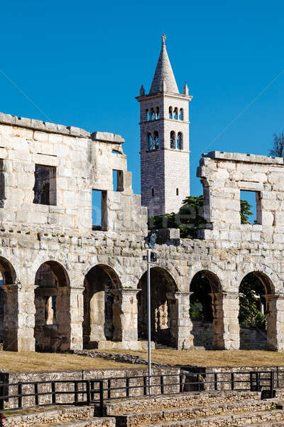 Stock photo: White Church and the Ancient Roman Amphitheater in Pula, Istria,