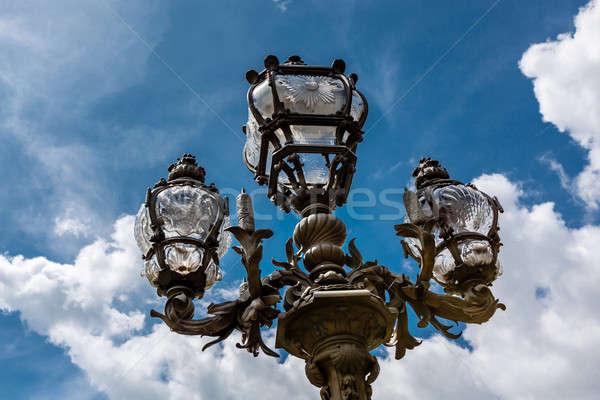 Street Lantern on the Alexandre III Bridge against Cloudy Sky, P Stock photo © anshar