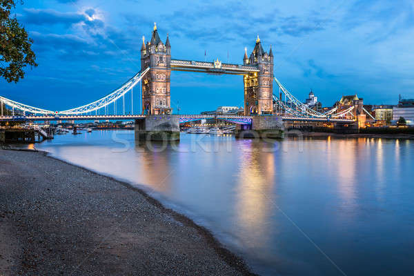 Stock photo: Tower Bridge and Thames River Lit by Moonlight at the Evening, L