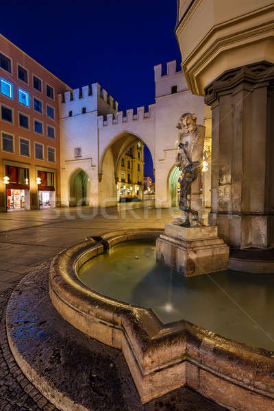 Stock photo: Brunnenbuberl Fountain and Karlstor Gate in the Evening, Munich,