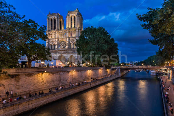 The Cathedral of Notre Dame de Paris and Seine River in the Even Stock photo © anshar