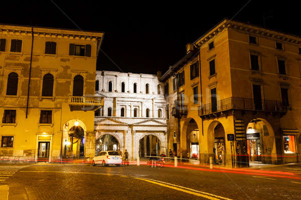 Ancient Roman Porta Borsari Gate in Verona at Night, Veneto, Ita Stock photo © anshar