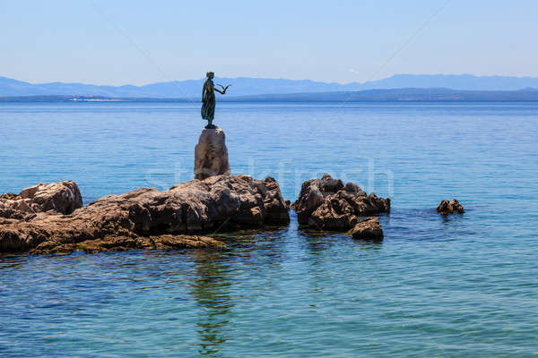 Bronze Sculpture of Maiden with Seagull on Background a Sea in O Stock photo © anshar