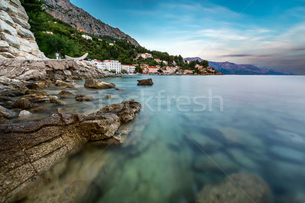 Rocky Beach and Small Village near Omis at Dusk, Croatia Stock photo © anshar