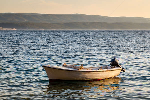 Lonely Boat and Island Brac at Sunset, Dalmatia, Croatia Stock photo © anshar