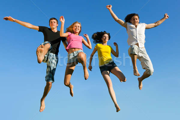 Springen vooruit hemel vier jonge jongens Stockfoto © Antartis