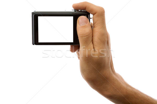 Photo camera in hand isolated on white Stock photo © Antartis