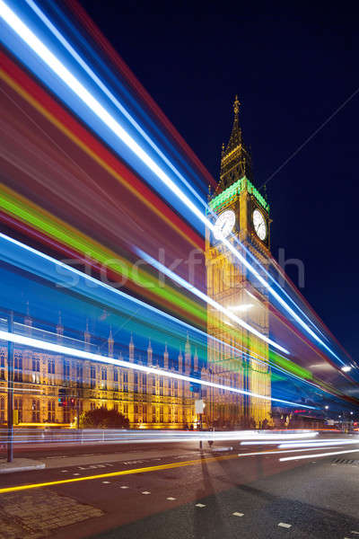 Big Ben behind light beams at twilight time, London, UK  Stock photo © Antartis