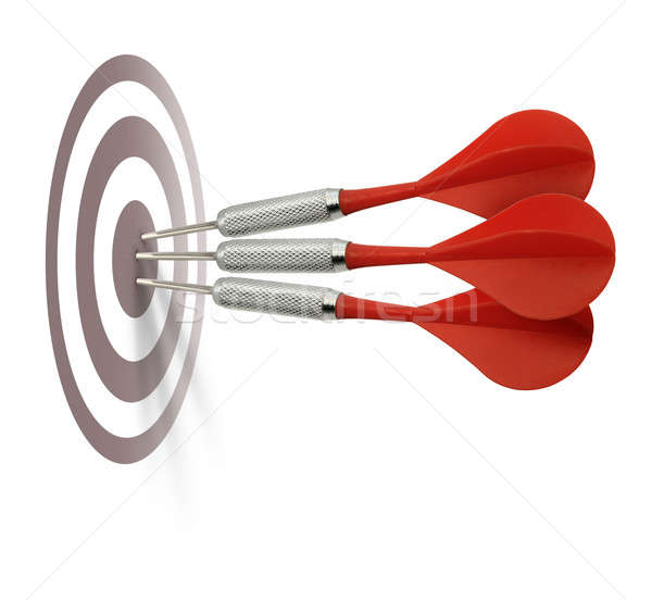 Three red darts hitting target Stock photo © Anterovium