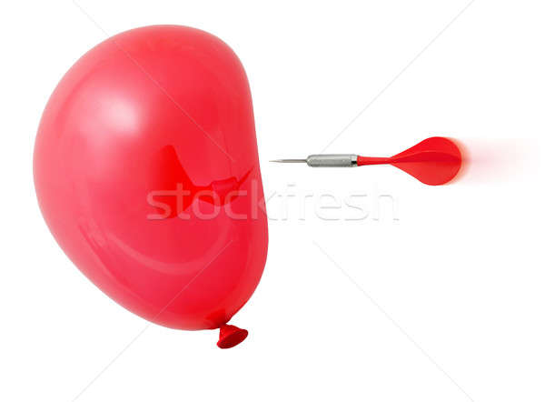 Dart about to hit red air balloon Stock photo © Anterovium