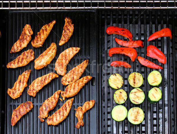 Barbeque tyúk forró grill piros paprikák Stock fotó © Anterovium