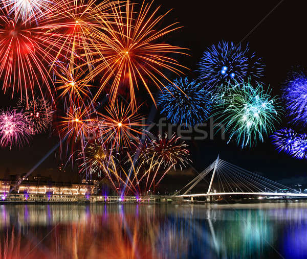 Colorato fuochi d'artificio acqua bella ponte scenario Foto d'archivio © Anterovium